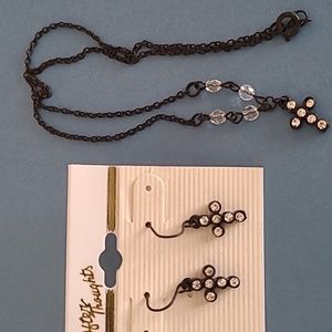 Cross necklace and earrings.